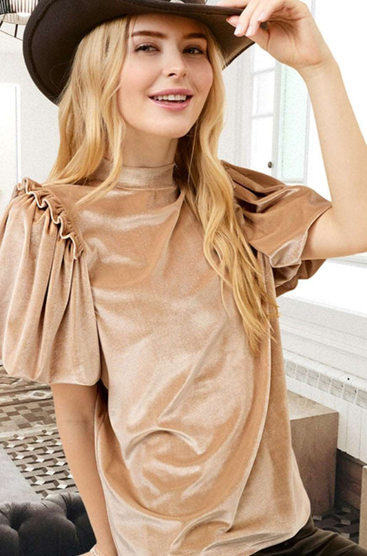 A woman wearing a hat and smiling, showcasing the Claim To Love Ruffle Sleeve Blouse.